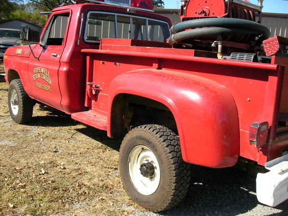 Red 1979 Ford F-350 fire truck, 3q-front view, with 'HOPEWELL STOW CREEK FIRE DEPT' text