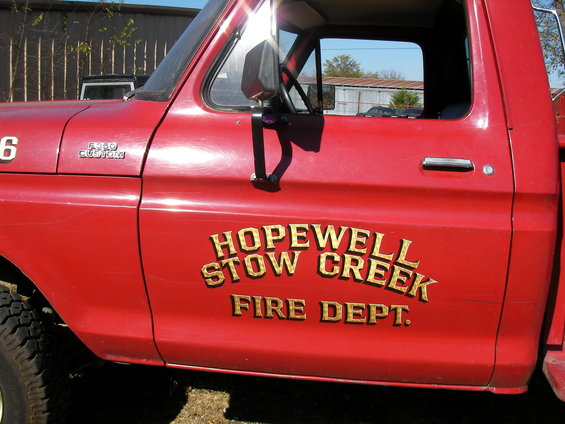1979 Ford F-350 side view, red fire truck door with 'HOPEWELL STOW CREEK FIRE DEPT.' text