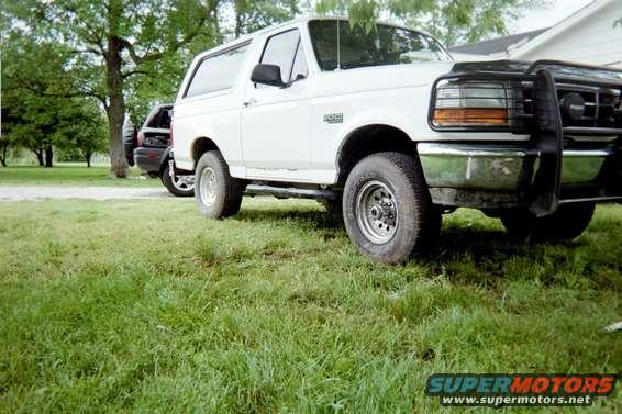 after_pass.jpg Taken from the same position as the before picture.  Totally finished.

Now, just a side note, it seems to me that as these springs "set" to my Bronco, instead of getting lower as the springs break in, they actually seem to be raising more, I will take more pics and measurements this coming weekend.  As it sits (as of completed day) I went from 34" to 36" from the ground to my fender.