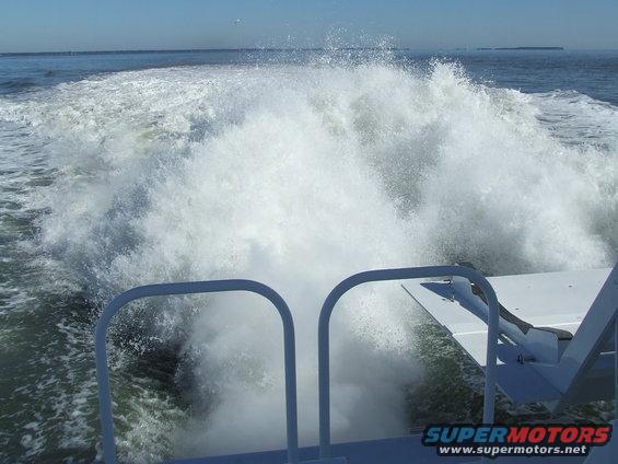 Boat wake behind a vessel on the water