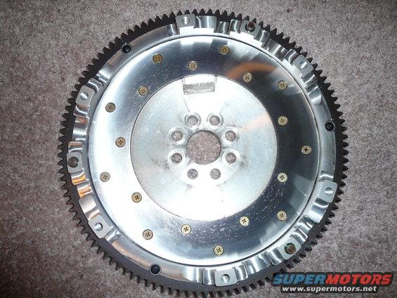 Aluminum flywheel with gear teeth around the edge