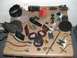 1989 Ford Bronco II - Various automotive parts are laid out on a table, including lenses, switches, and a speaker.