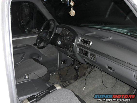 Interior view of a 1992 Ford F-Series truck dashboard and seats