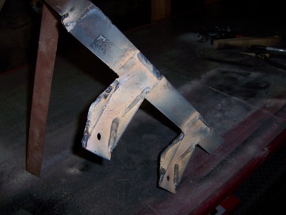 welded metal bracket with holes