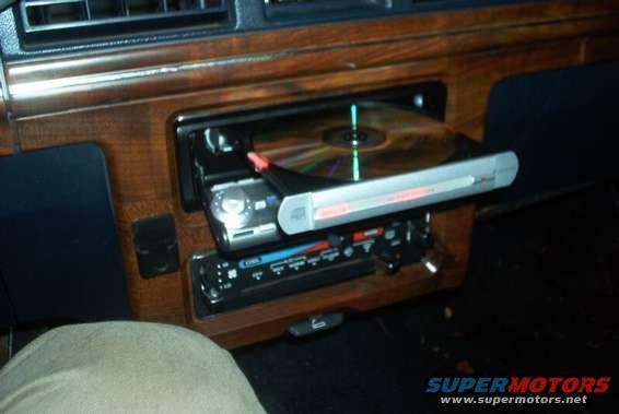 Although totaly pointless, I love the tray load CD.  Just looks so nice.