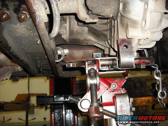 trans-swap-008.jpg after unbolting the trans mount from the cross member jack up the t-case to remove the transmount and crossmember
