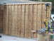 2005 Ford Mustang - A construction scene shows an unfinished wall with exposed studs and plywood, alongside power tools.