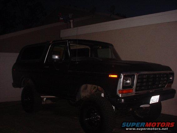 Black 1979 Ford Bronco with lifted suspension and aftermarket wheels