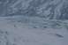 1990 Chevrolet Suburban - A vast expanse of a glacier with textured ice and snow under a muted sky.