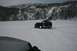 1990 Chevrolet Suburban - Off-roading in a snowy landscape with a Jeep Wrangler navigating deep snow.