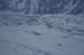 1990 Chevrolet Suburban - A vast, snow-covered glacier with visible crevasses and icy blue hues, set against a backdrop of snow-dusted mountains.