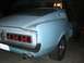 1967 Ford Mustang - Rear view of a light blue 1967 Ford Mustang coupe with horizontal taillights and a visible license plate.