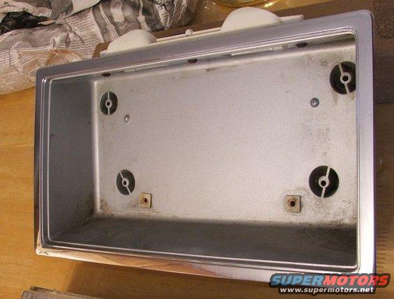 Interior vehicle part with mounting holes and chrome trim