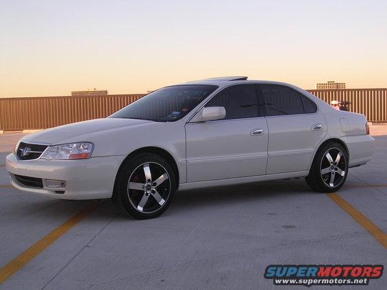 White 2003 Acura TL sedan, 3/4 front view, aftermarket wheels