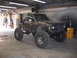 1984 Ford Bronco II - This heavily modified 1984 Ford Bronco II features oversized tires and a custom front bumper, ready for off-road adventures.