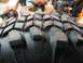 1992 Ford Mustang - Close-up view of a heavy-duty tire tread with deep, blocky lugs.