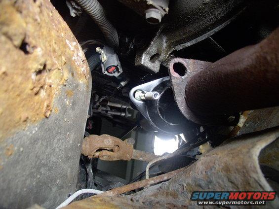 How did I get the Y-pipe to bolt up ? It was @ 1 1/8" too narrow, meaning I had to widen the headpipes away from each other. I just jammed an old shovel handle down one and bent it gently 3 times until it BOLTED RIGHT UP to the supposedly Mustang only headers