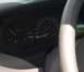 1998 Ford Taurus - Interior view of a car's dashboard, a speedometer and fuel gauge.