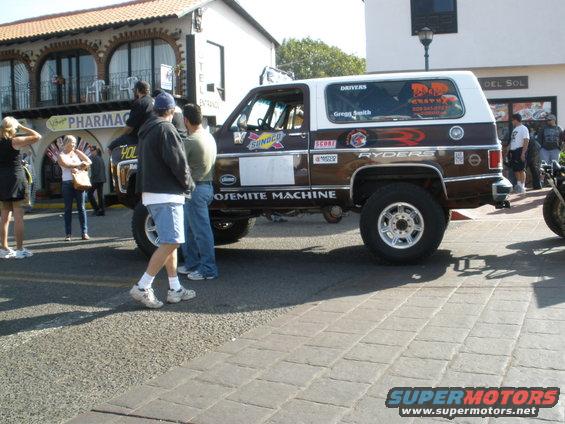 Brown and white SUV with racing decals and 'ROSEMITTE MACHINE' text