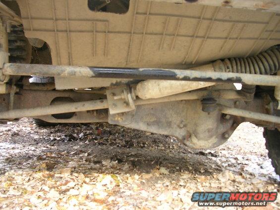 Undercarriage view of vehicle suspension and differential