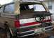 1988 Ford Bronco - This 1987 Ford Bronco shows significant rust and wear on its rear end and spare tire mount.
