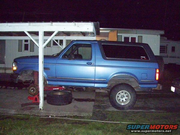 Front brake exposed and full side view of 1992 Fullsize Bronco XLT