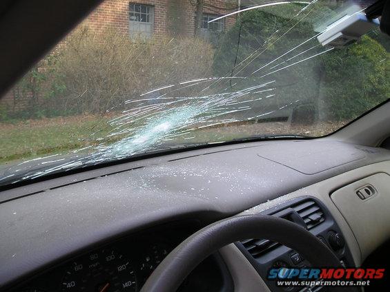 windscreen2.jpg Hit rock at 70+ mph. Little glass shards went all the way back to the parcel shelf under the rear window
