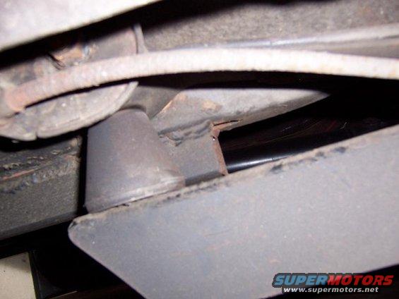 sub-frame connector and front of extended traction bar with Aerostar axle snubber