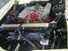 1969 Mercury Cyclone - Close-up view of a car's engine compartment, highlighting the V8 engine and its components.