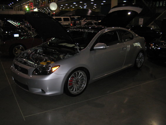 Silver 2005 Scion tC coupe, 3/4 front view, hood open