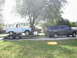 2000 Ford Excursion - 2000 Ford Excursion is seen towing a classic Ford Bronco on a trailer.