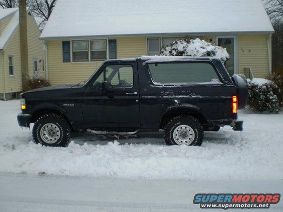 Black 1996 Ford Bronco parked in snow