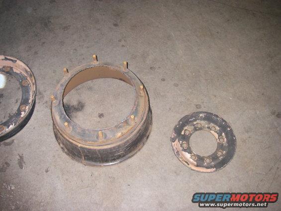 Wheel hub assembly and separate ring with studs on concrete floor