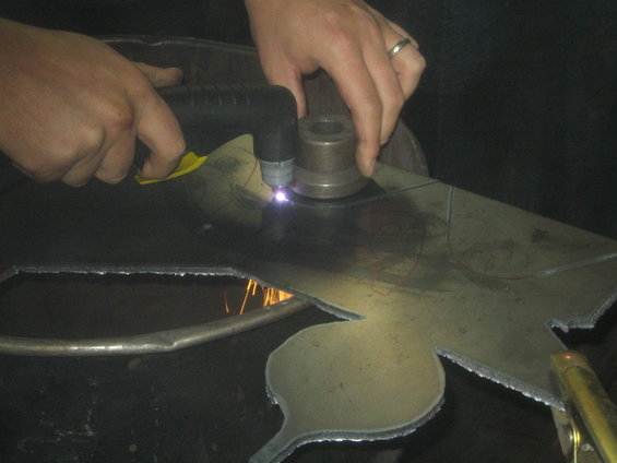 img_8414.jpg cutting out mounting brackets.