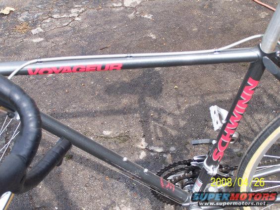 Schwinn Voyageur bicycle frame with red lettering, showing chain and pedals