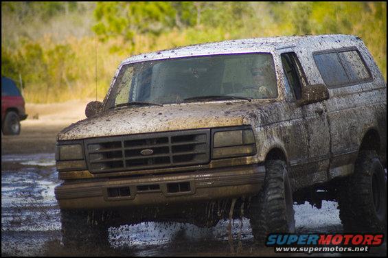 1996 Ford F-150 Bronco in mud, 3q-front view