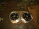 1992 Ford Bronco - A pair of vehicle brake rotors are shown resting on wooden planks.