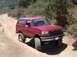 1996 Ford Bronco - This red Ford Bronco appears to be from the early to mid-1990s, possibly a 1992 model.