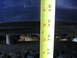 1978 Ford Bronco - A measuring tape is used to show the height of a blue vehicle's body above its suspension and tires.