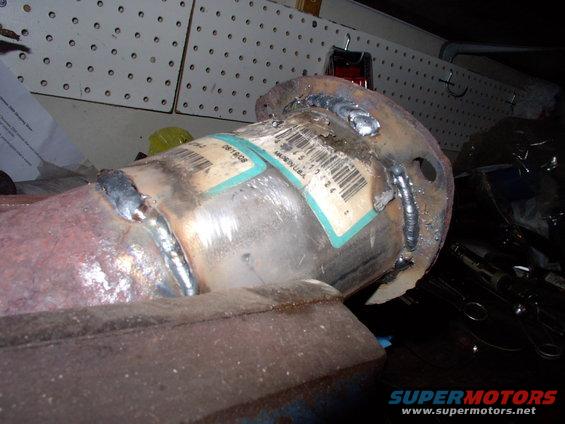 img_0025.jpg What do you do, after six years of Ontario salt damage, when your collector flange falls off when the pipe rots on you ? You buy a $5.00 reducer (3" O.D. to 3" I.D. from Canadian Tire) and weld it back on.