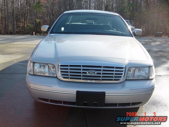 Silver 2000 Ford Crown Victoria front view