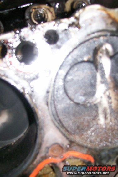 Engine cylinder head with valves and signs of wear