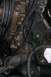 1992 Ford C-350 (Centurion Conversions) - Close-up of an engine component, possibly related to a head gasket repair.