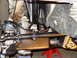 1996 Ford Bronco - Close-up view of the front suspension system, including the tie rod and ball joints.