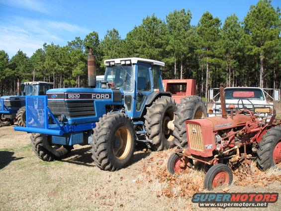 shiny new brushguards on the tractors. the bushes and trees screw up the side panel sliders. Cool little Farmall 140 too