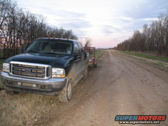while refilling the planter, I got a quick shot of the 02. We're in the river bottoms, check out the long, straight road. This has been farm land for years and years.