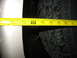 1995 Ford C-350 (Centurion Conversions) - Measuring tire clearance with a tape measure. The tape shows measurements from 33 to 38 inches.