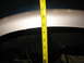 1995 Ford C-350 (Centurion Conversions) - Measuring fender gap with a tape measure. The measurement is approximately 40 inches.
