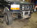 1995 Ford C-350 (Centurion Conversions) - Front view of a 1995 Ford C-350 (Centurion Conversions) with the bumper removed, revealing the radiator.