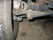1995 Ford C-350 (Centurion Conversions) - Worn suspension components, including a ball joint and tie rod end, are visible near a tire.